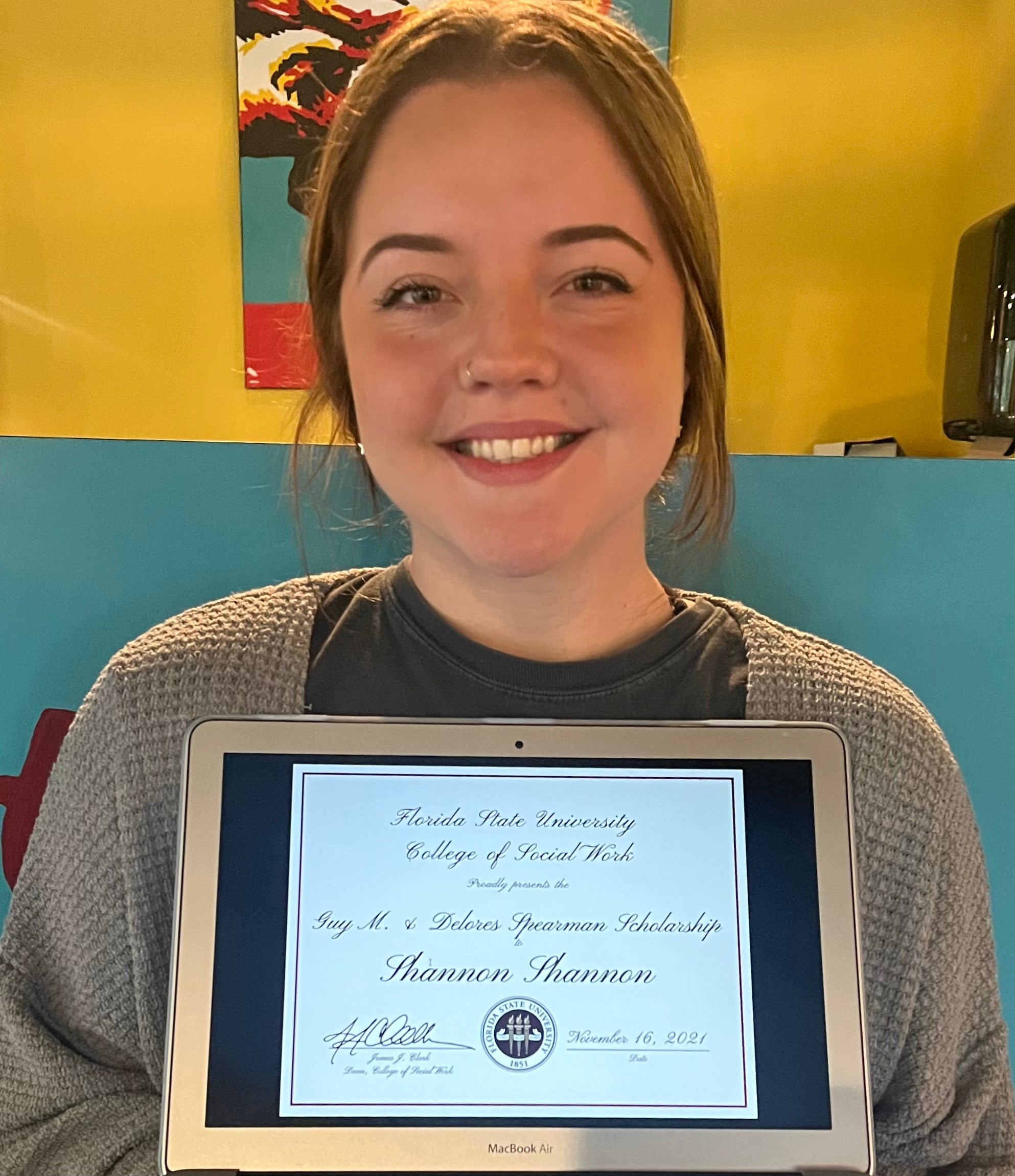 Shannon receiving the Spearman Scholarship