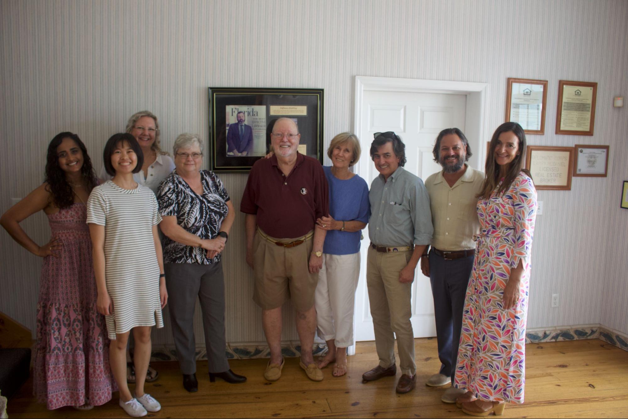 Left to right: MSW Online Students Shivani L., Amy C., Jennifer A., Dawn C.; Guy Spearman, Delores Spearman, Provost Clark, Dean Springer, and Sunny Springer