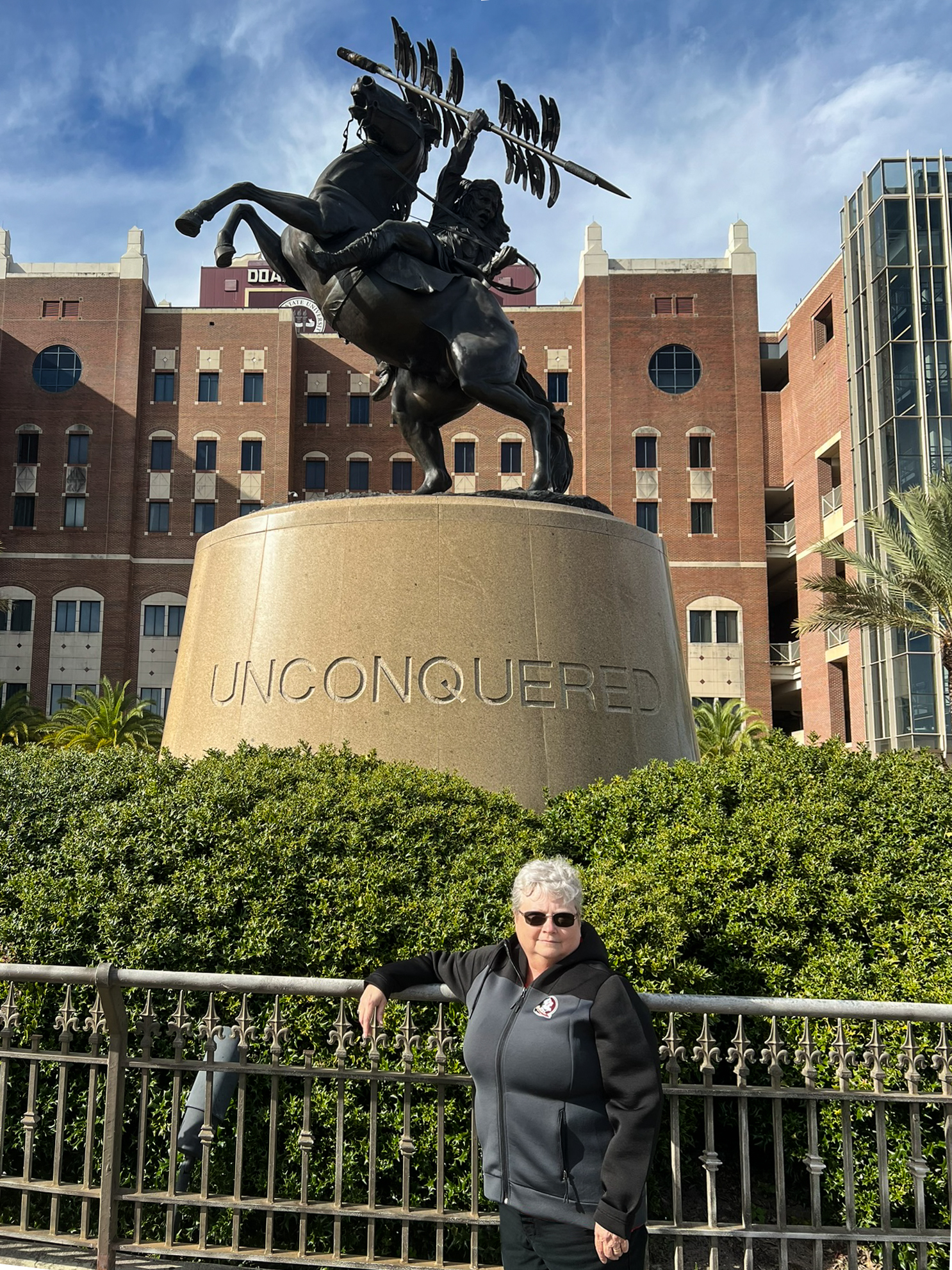Dawn posing in front of the Unconquered Statue at Doak S. Campbell Stadium. 