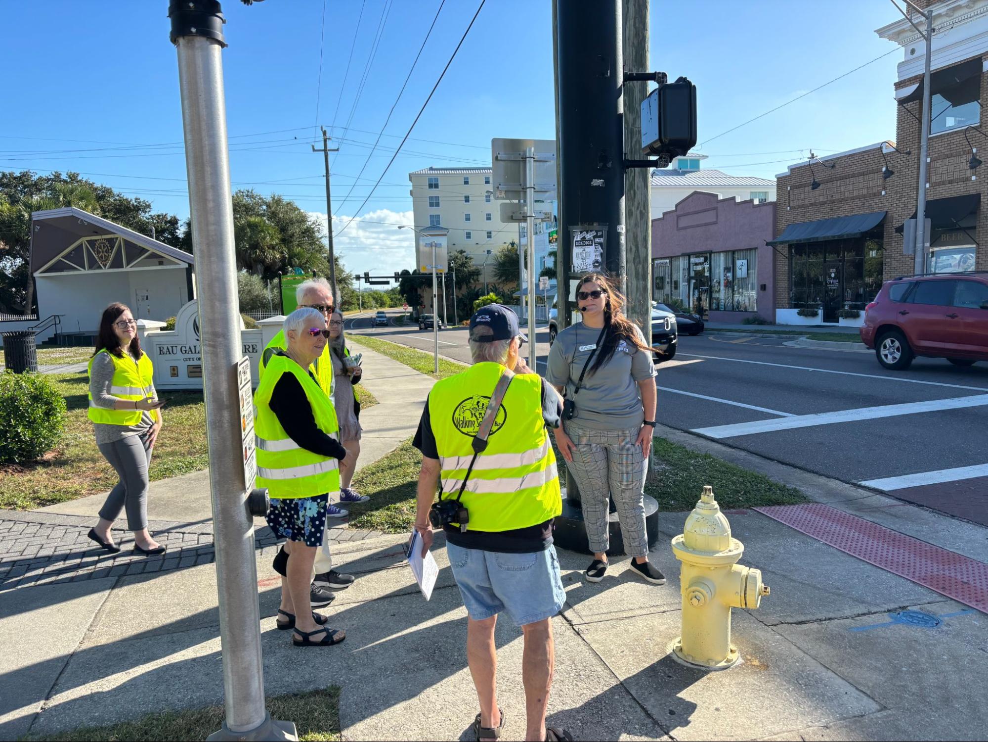 Participants of TPO Pedestrian Education event learning about crosswalk safety technologies